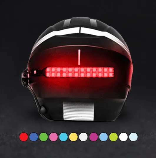 blizzard buster helmet safetey light installed on a black helmet with a graphic of the different selectable colors underneath
